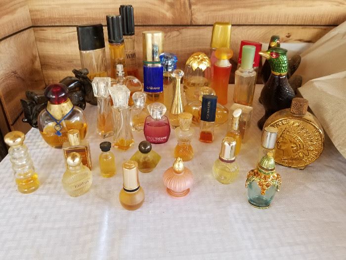 Collection of vintage perfume and perfume bottles. https://ctbids.com/#!/description/share/136935
