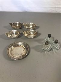 Sterling silver ash receiver, 4 individual nut dishes. https://ctbids.com/#!/description/share/137333