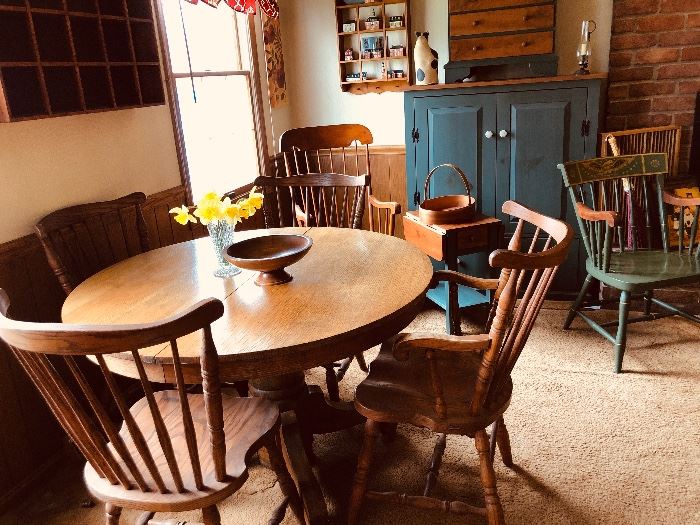 Oak round pedestal table and chairs 