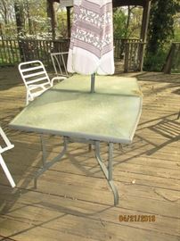 PATIO TABLE AND 6 CHAIRS