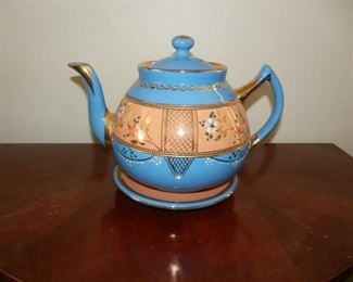 BLUE AND BROWN TEAPOT W/SAUCER MADE IN ENGLAND