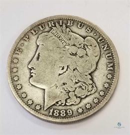 1889 Morgan Dollar / O
