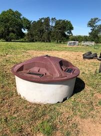 Molasses cattle feeder