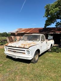 Old Chevy project truck. Not running. White: 1967 6 cylinder small window long bed