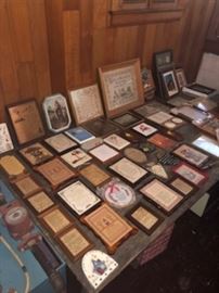 Pictures and plaques, many religious, many brand new.