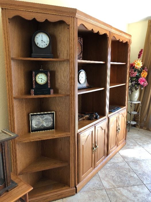 Four-section oak finish display shelves, sold separately or together - $495 (Includes 2 end/corner 5-shelf units - $55 EA, 2 wall units w/3 shelves and lower cupboard - $195 EA) 
