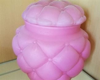 Cushion patterned pink glass covered jar
