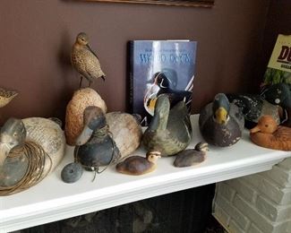 Selection of duck decoys and shore birds