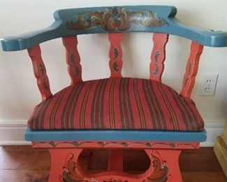 One of set of four rosemaling painted chairs with cushion seat.