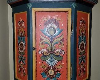 Judith Nelson rosemaling painted three sided wall cabinet.