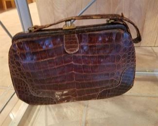Alligator hand bag.