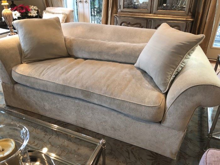 Custom-upholstered designer sofa with down-filled cushions
