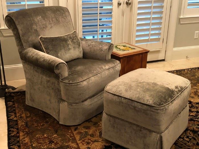 Custom-upholstered designer armchair with ottoman