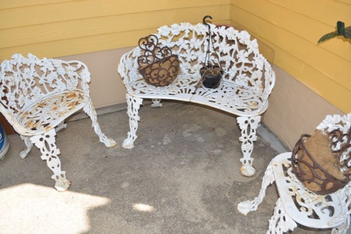 Ornate Victorian cast iron outdoor settee set 