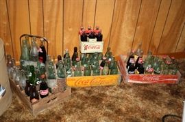 Great selection of coca cola RC and other crates and bottles
