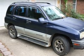 2001 Chevy Tracker. 220,000 miles.  4WD works.  Owned by Mechanic. Runs and drives Great.  Dependable!  $1500