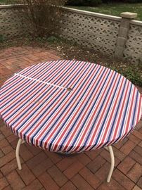 Outdoor patio table with cover