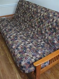 Futon with wood frame. Clean and intact
