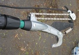 Chain driven extension pole trimmer. Very long and powerful