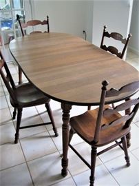Table, 4 chairs and 2 leaves