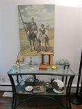 The painting is an oil, signed by the artist.