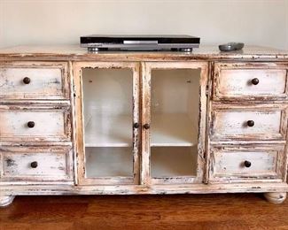 Shabby Chic: TV stand with three drawers on either side and room for components below.
