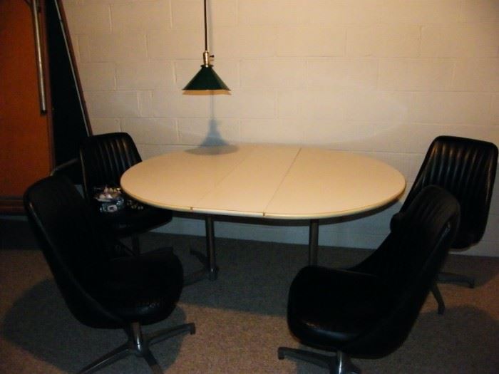 retro table with 4 swivel chairs