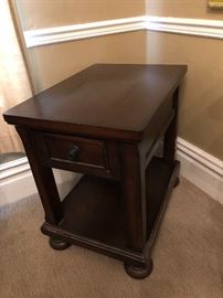 Modern classic Empire style end Table. Mahogany finish, one drawer, bun feet.