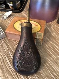 Brass and copper black powder flask.
Embossed Canon, crossed flags, and crossed Guns.