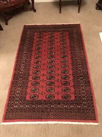 Bokara terra-cotta rug. All over “elephant foot” pattern. Wool. 6.5 x 4.2. Perfect condition. Hand woven in Pakistan.