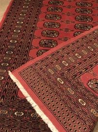 Bokara terra-cotta rug. All over “elephant foot” pattern. Wool. 6.5 x 4.2. Perfect condition. Hand woven in Pakistan.