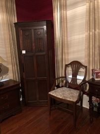 English wardrobe. Versatile size. Will fit easily into a corner. Inside has mirror, hangers, hooks, and cedar floor. Original hardware, locks.