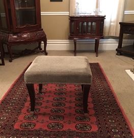 Silver studded with silver feet  upholstered bench. Perfect for resting your feet, handy when you need extra seat seating. Nice vanity bench. 