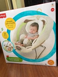 Fisher-Price deluxe bouncer. New in box. Never used.