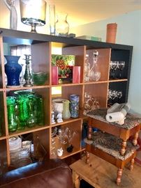 The bookshelf is for sale as well. 2 footstools