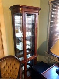 Magnificent lighted curio cabinet