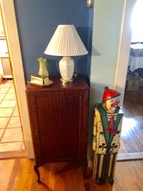 Antique music cabinet. There are 2 clown CD / DVD storage cabinets!