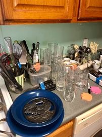 lots of unique kitchenware items & utensils, fine knives