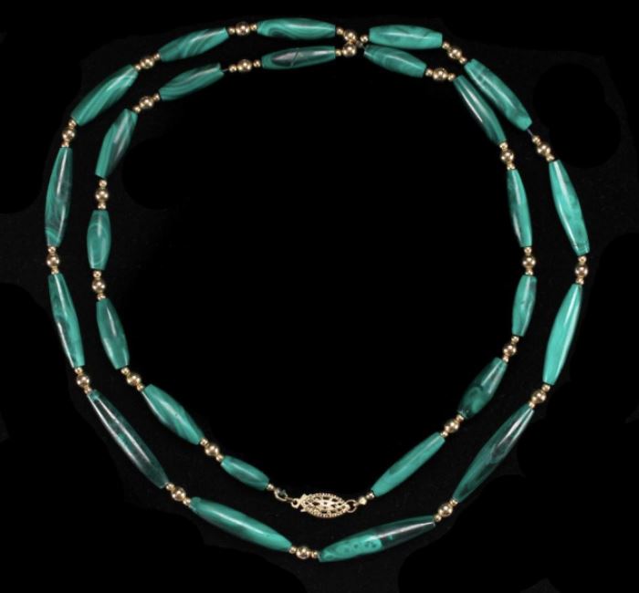 Description: Malachite and 14K yellow gold bead necklace. Length: 28 inches. 
Weight: 1.09 ounces troy.
Dimensions: 9 inches.