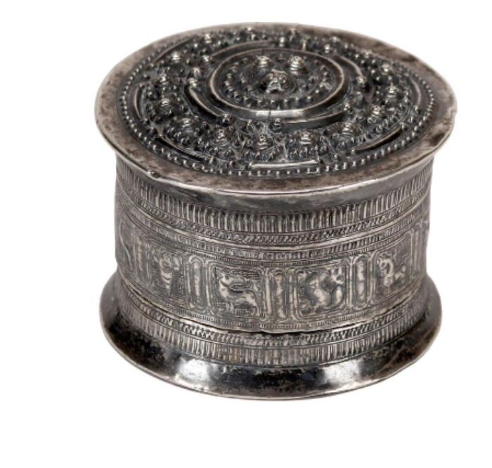 Thai 19th C. Silver Betel Nut Box                                                   
Description: Low Estimate: 300 
High Estimate: 500 
Condition: Very Good 
Height: 3 3/4 inches 
Weight: 9 ounces. 
Circa: 1900
Dimensions: 9 3/8 inches.
Condition Report: Very Good
Notes: 9 ounces.