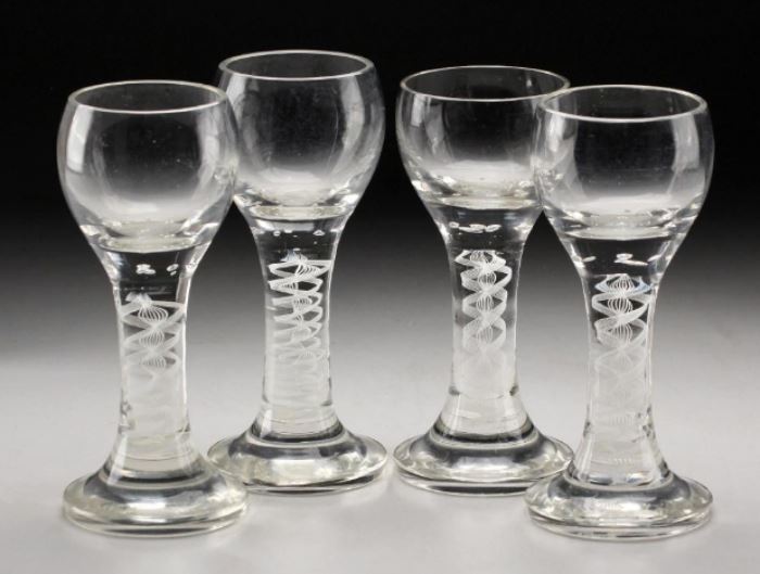 Four Continental Crystal Cordial Glasses                           Description: Lot comprised of four crystal cordials with circular bowl on a thick stem with double series opaque twists on a conical foot. 
Condition: Very Good 
Height: 6 3/4 inches. 
Weight: 4 lbs.
Condition Report: Very Good
Notes: 4 lbs.