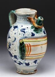 Italian 18th C. Majolica Wet Jar                                                  Description: Italian Majolica faience wet jar, blue and white having a front reserve, blue and white scrolls to body. Shipping weight: 3 lbs 4 oz