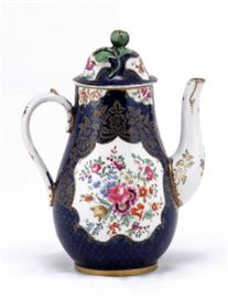 English Booths 19th C. Porcelain Tea Pot                                  
Description: An early 19th century English porcelain tea pot in the manner of Booths, having a rich cobalt ground and a reserve with hand painted flowers, top having an unopened poppy finial, unmarked.