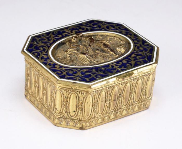 French 19th C. Bronze Trinket Box with Enamel Top          Description: A gilded bronze trinket box with hinged lid decorated in blue enamel with incised gild gilded swirls, center reserve with figures in relief.