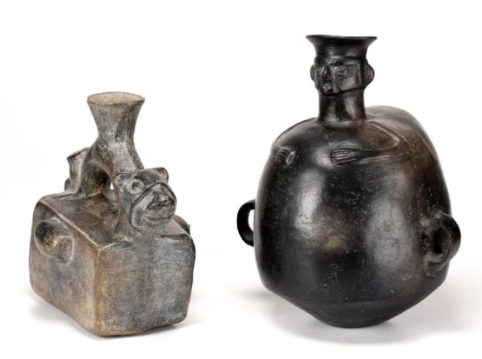Two PreColumbian Style Blackware Ceramic Vessels      Description: Lot comprised of a figural blackware vessel and a rectagular vessel with a man reigning an animal.
Condition Report: Very Good
Notes: 3 lbs.