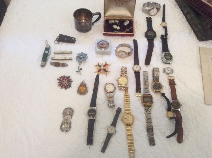 Watches and pocket knifes. 