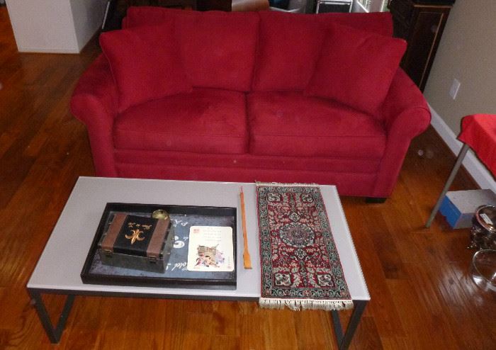 red love seat sofa & a coffee table
