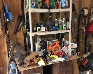 TONS of tools and such. Took benches in basement and garage. Plus this second garage full of tools! 