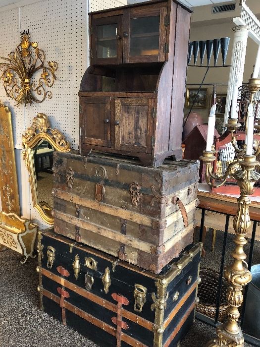 Collection of antique trunks with childs or maybe salesman sample hutch