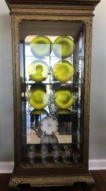 Gold and black china cabinet